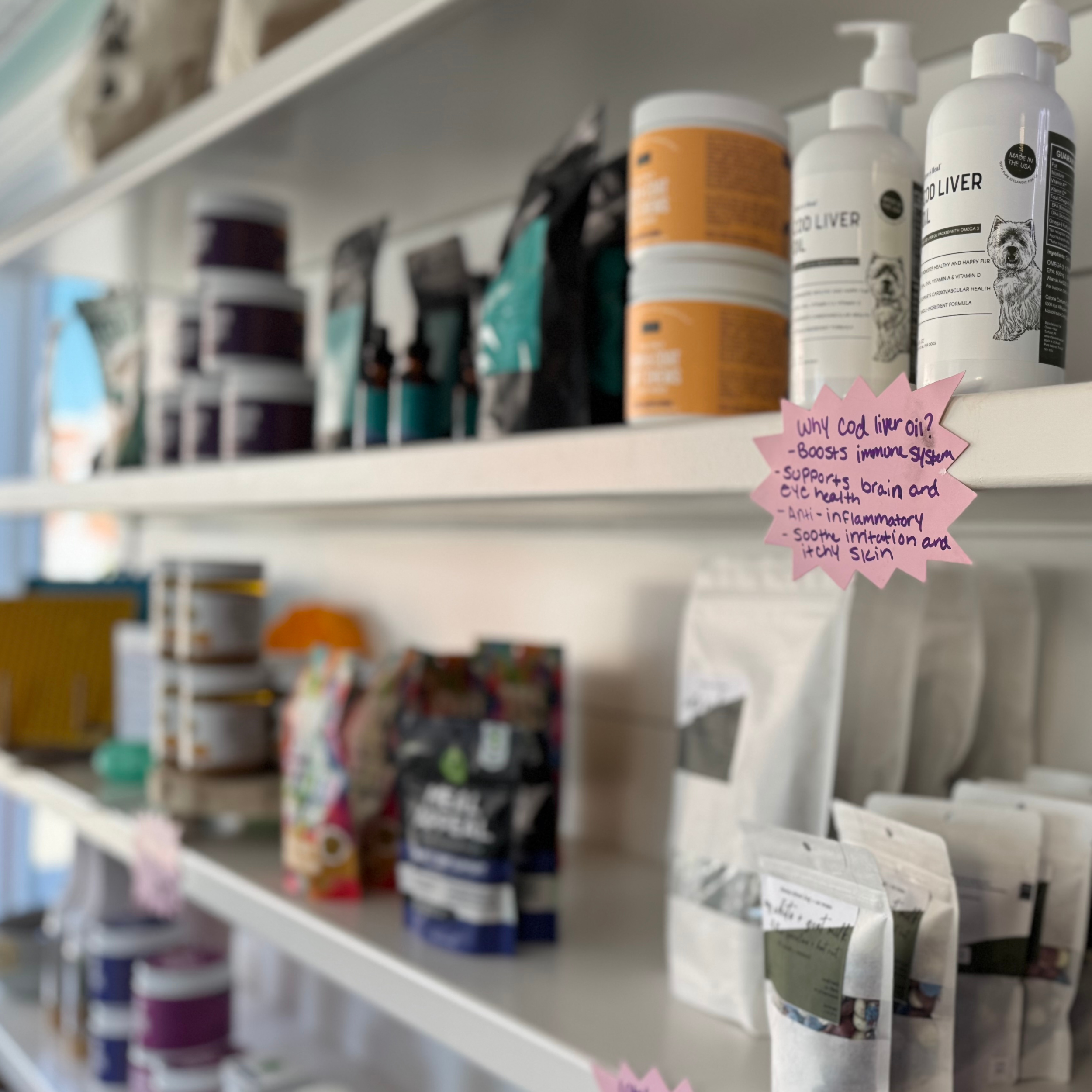 Shelves full of health and wellness products for dogs.