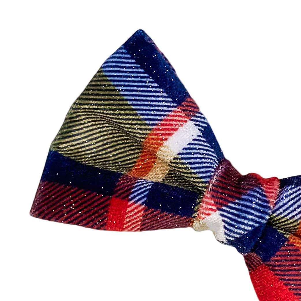 Plaid patterned dog bow tie on a white background.