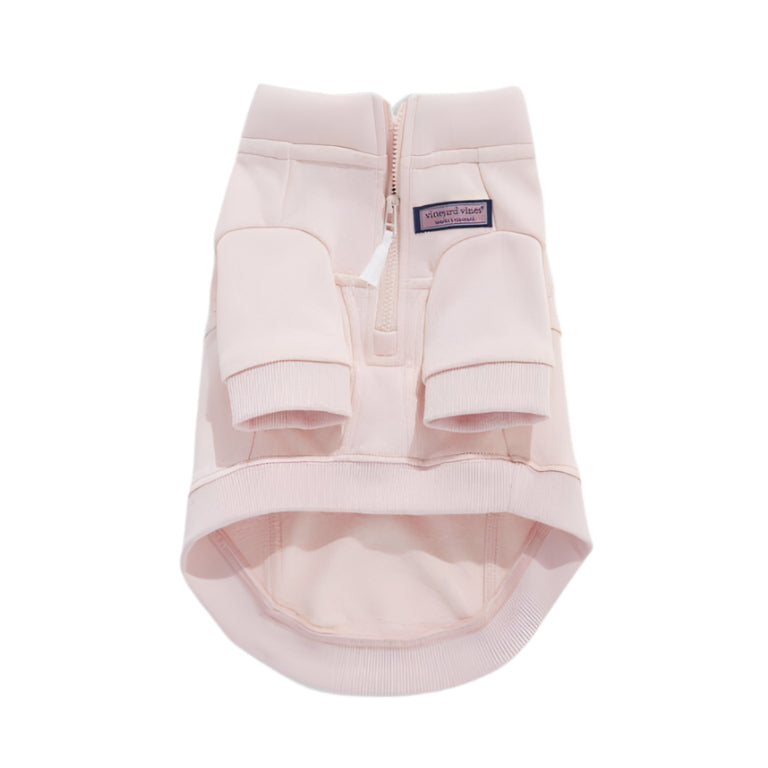 A super-cute, pink Vineyard Vines dog shirt with zipper on a white background