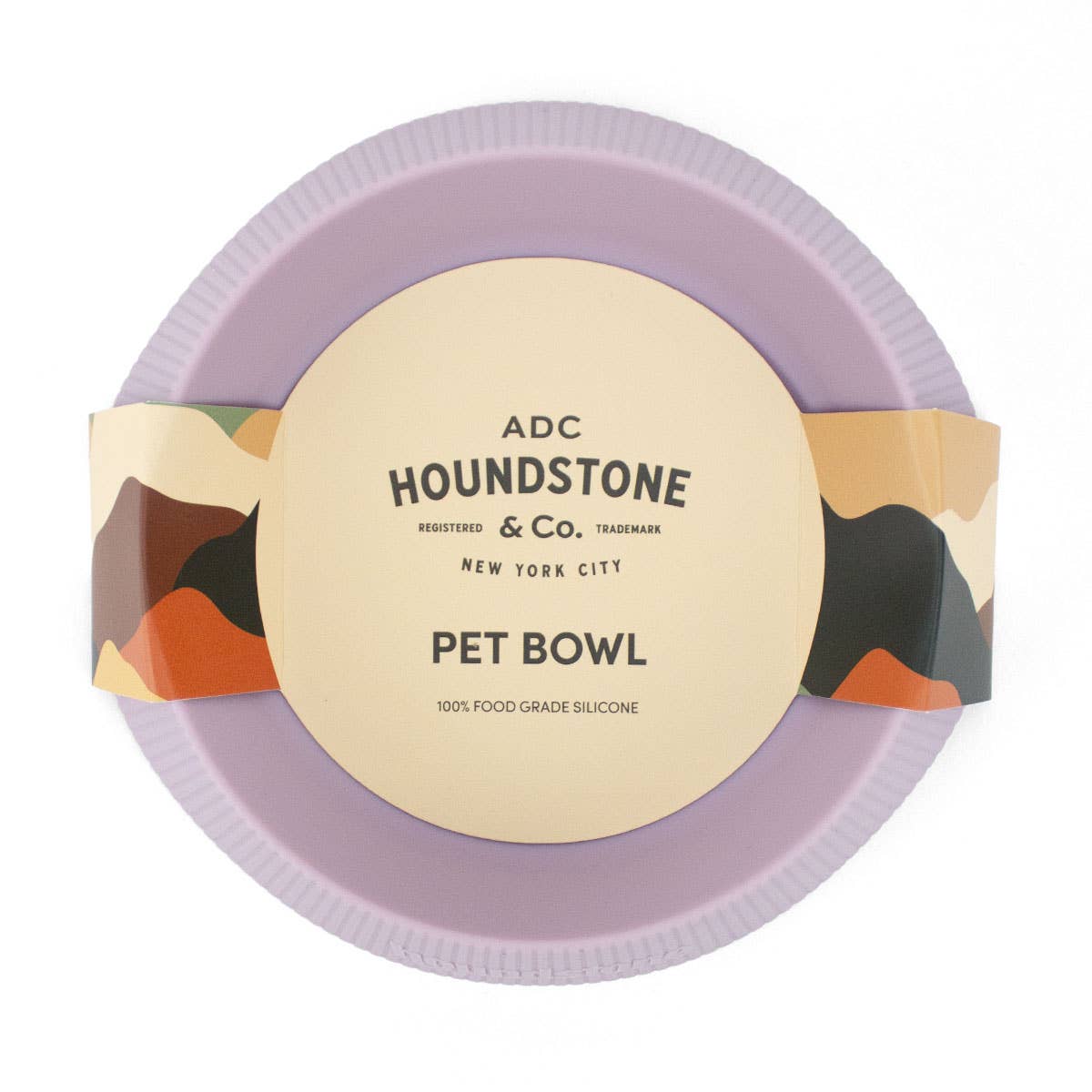 Mauve silicone travel pet bowl on a white background.