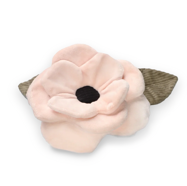 Floral-shaped squeaky snuffle toy with a soft pink petal and green leaf on a white background