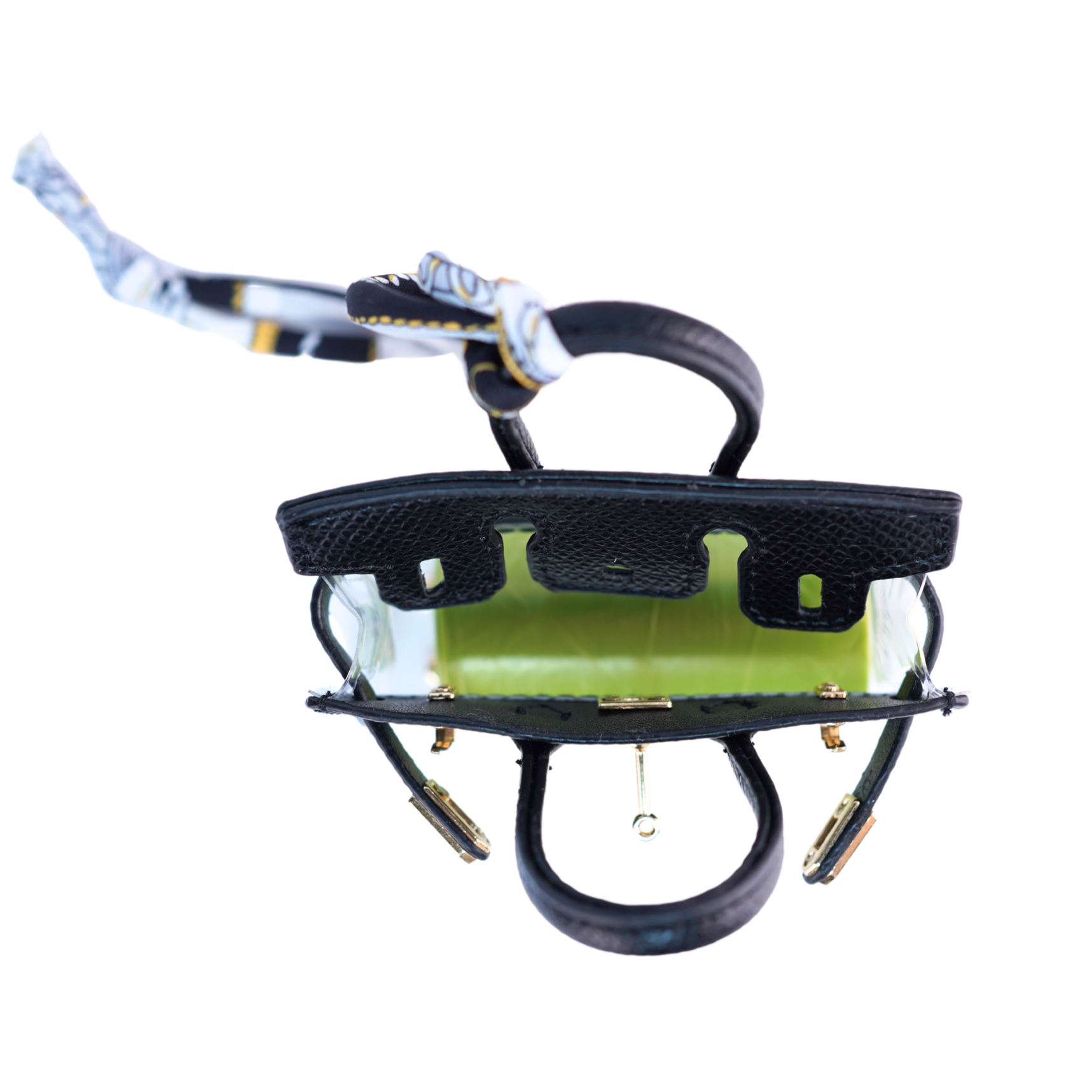 Top opening of black & clear handbag-shaped poop bag dispenser on a white background.