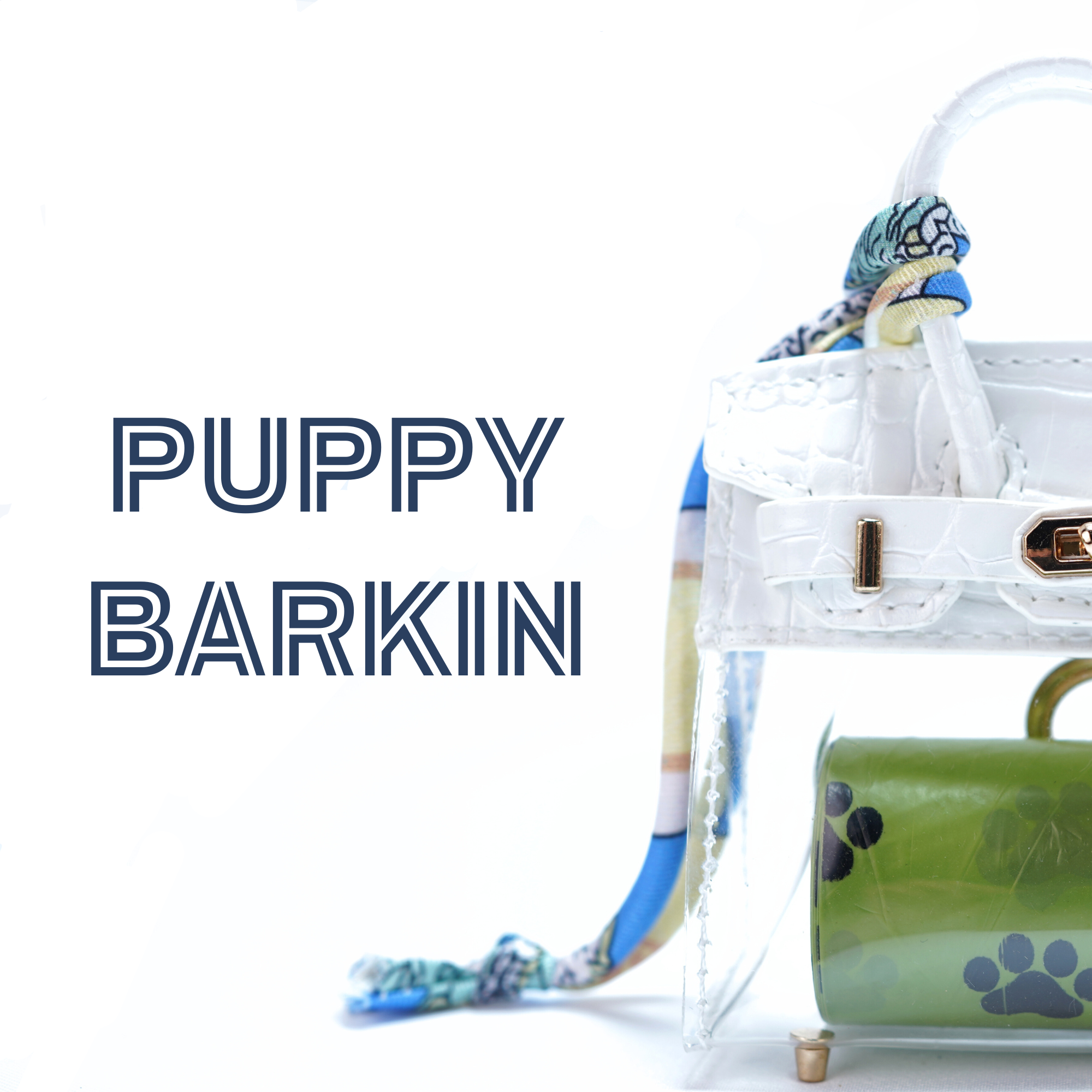 White & clear handbag-shaped poop bag dispenser with colorful cord and "Puppy Barkin" branding on a white background.