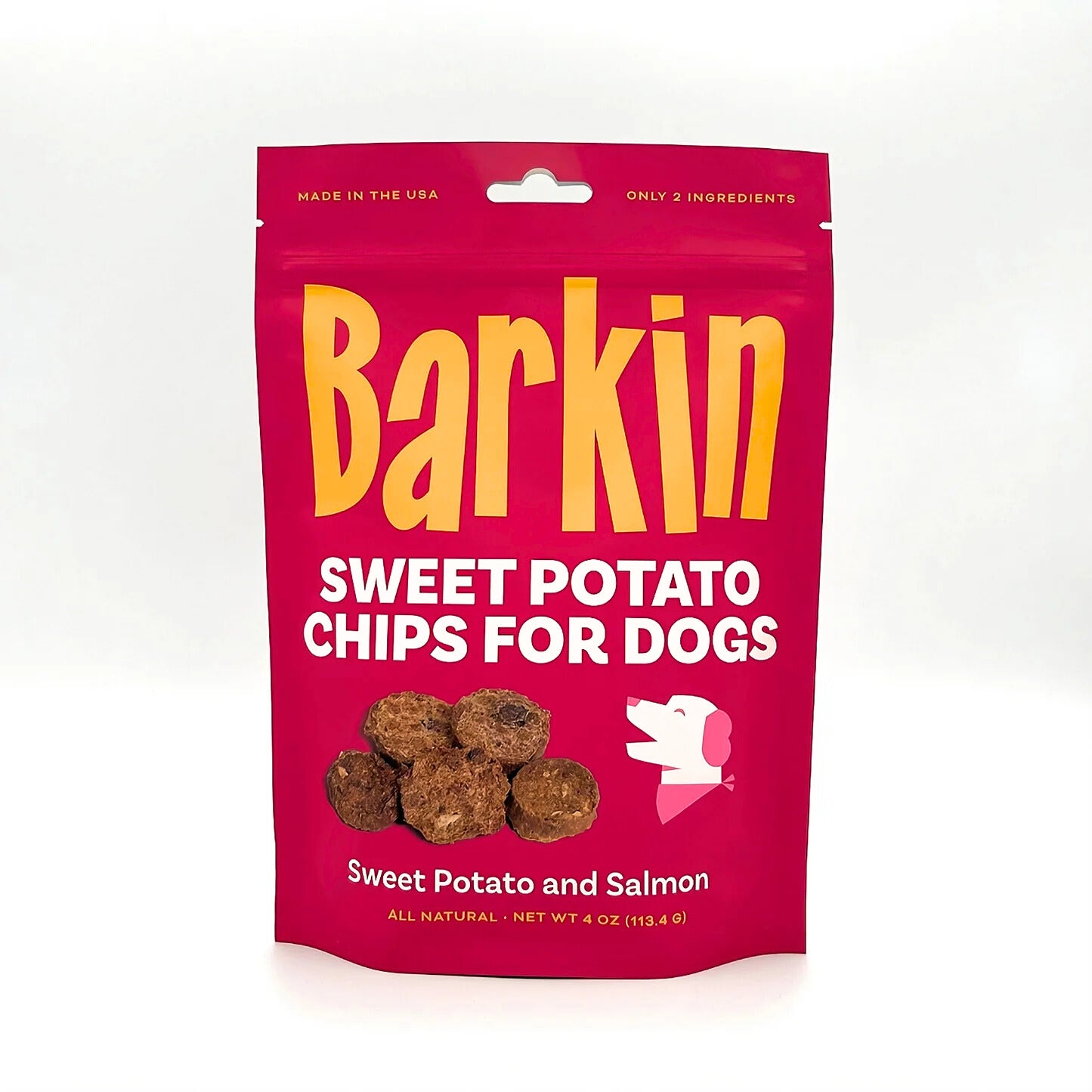 A fucsia bag of sweet potato and salmon chips for dogs with "barkin" written on it in yellow letters.