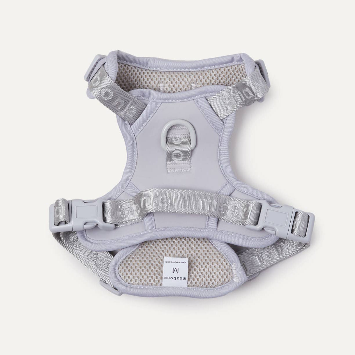 A gray easy fit dog harness on a white background.