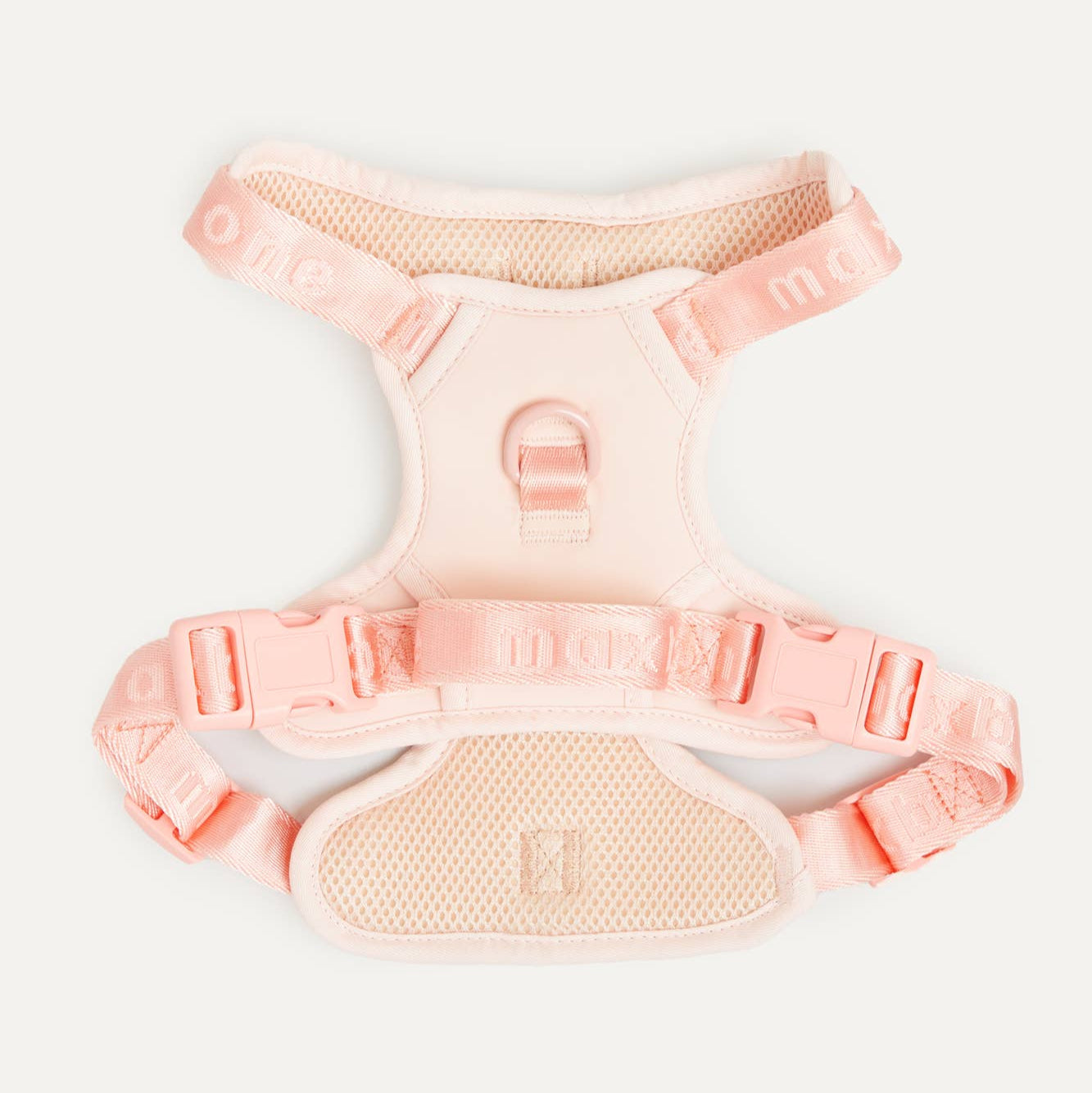 A pink/peach easy fit dog harness.