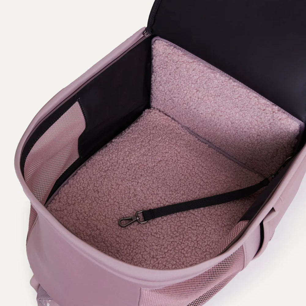 Maxbones's dusty mauve backpack pet carrier, open, in bed mode to show it's cozy, fluffy interior.