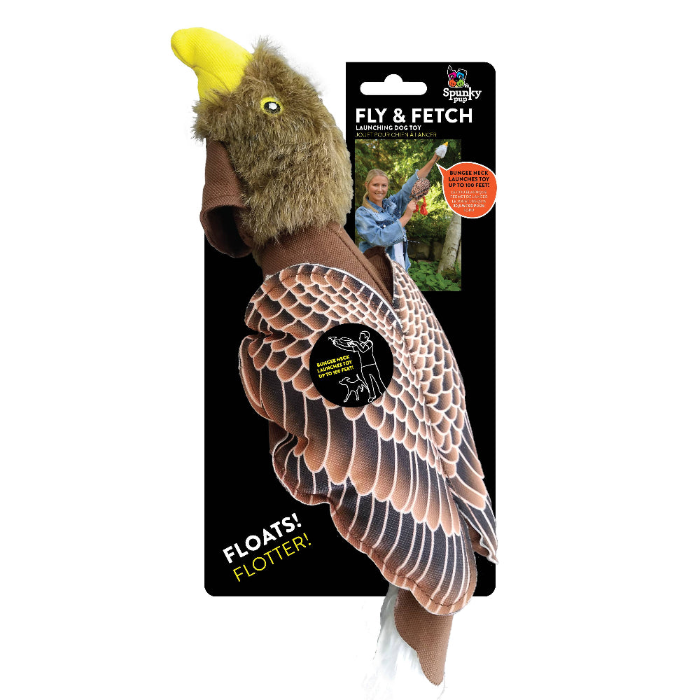 Fly and fetch dog toy shaped like an eagle with brown, white, and yellow colors, designed to float.
