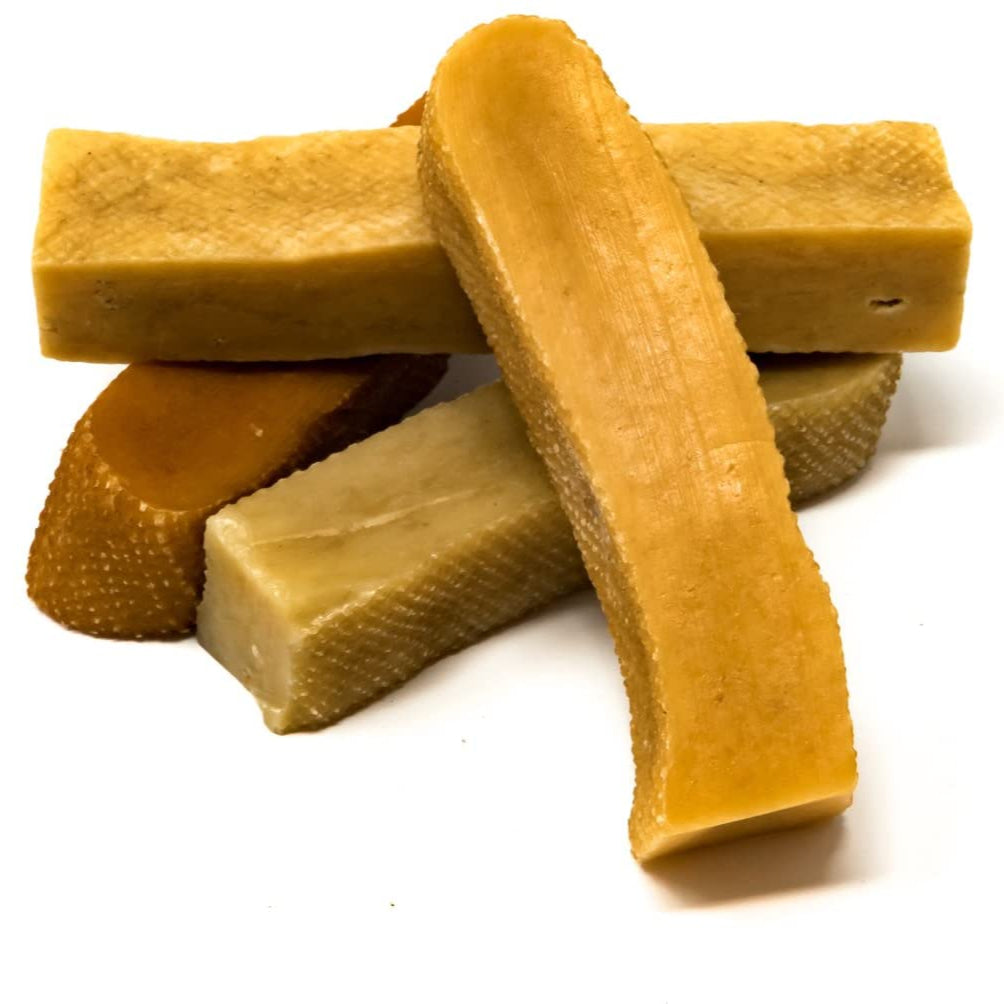 Yak milk chews on white background.
