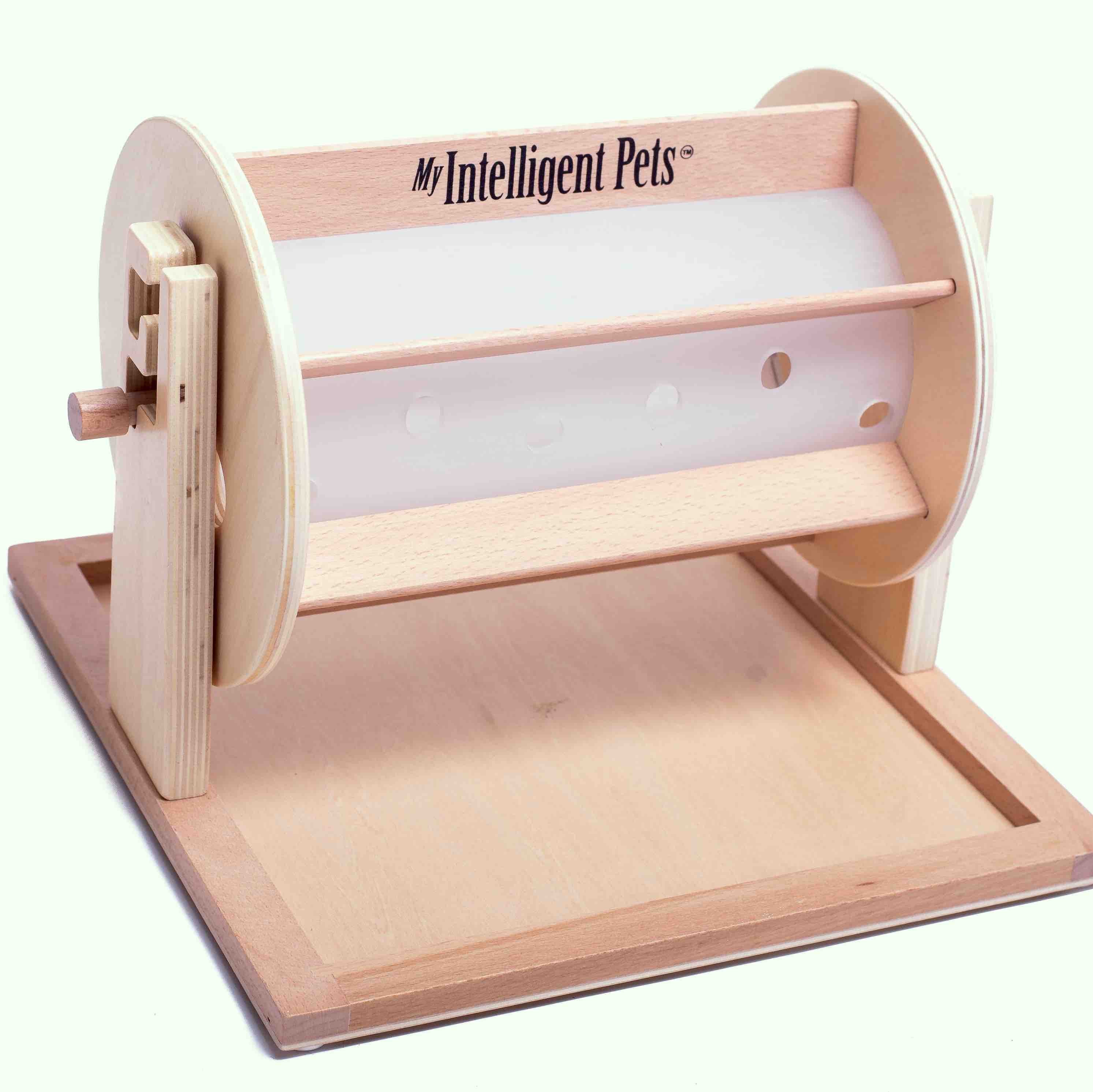 Wooden, treat-dispensing pet toy with a cylindrical component on a white background.