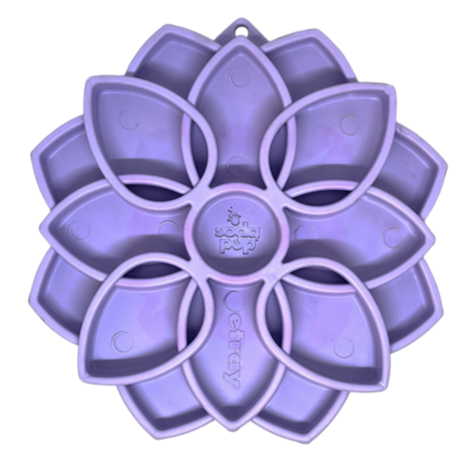 A purple floral-shaped dog enrichment tray with a mandala design and the brand SodaPup visible in the center.