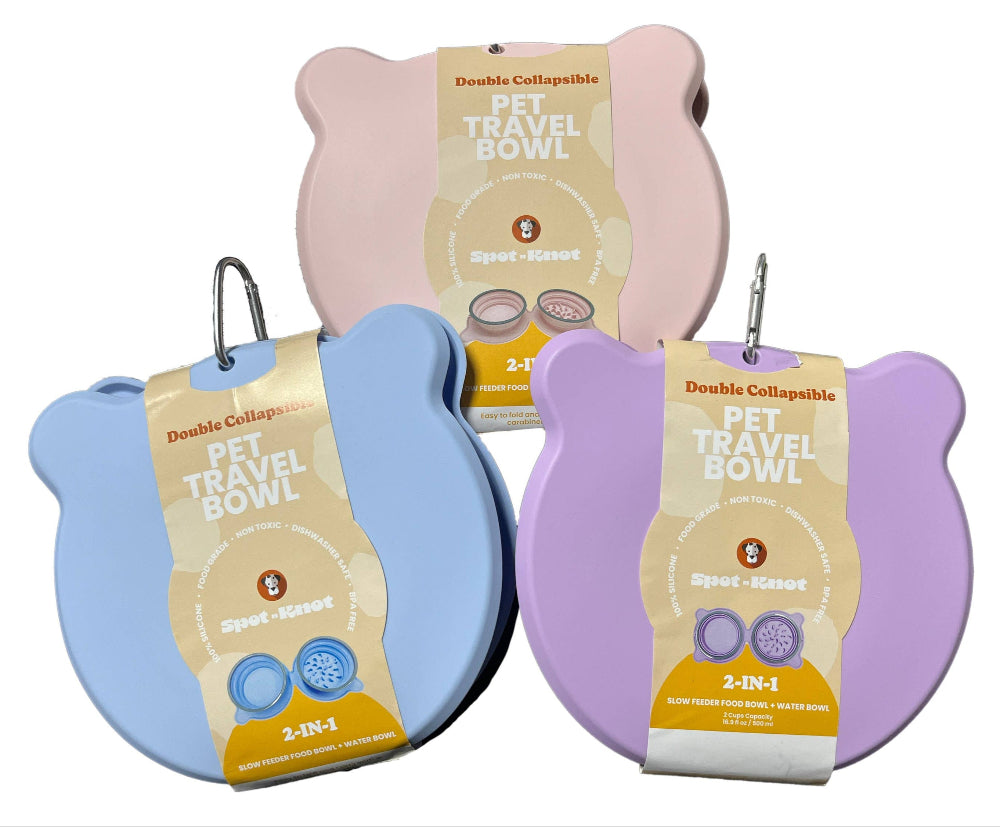 Three collapsible pet travel and slow feeder bowls in pink, blue, and purple with packaging on a white background.