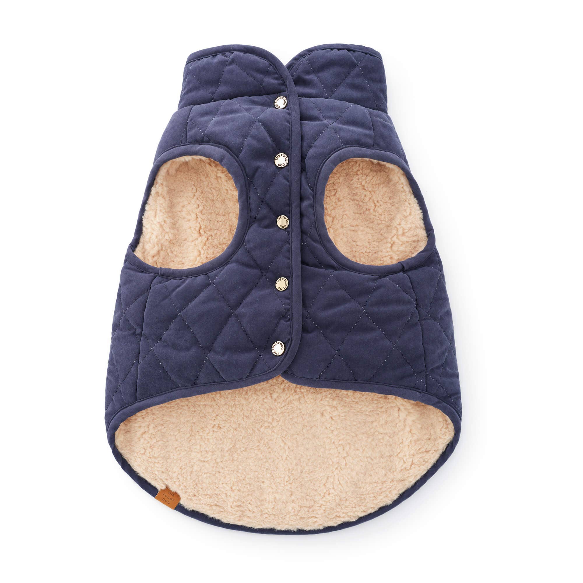 Navy blue quilted dog coat with beige interior on a white background