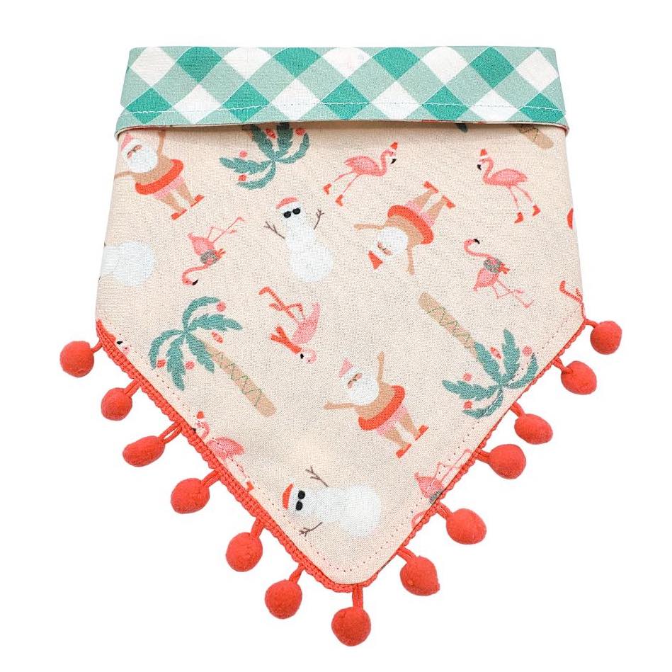 Cotton dog bandana with flamingo and palm tree pattern on a white background