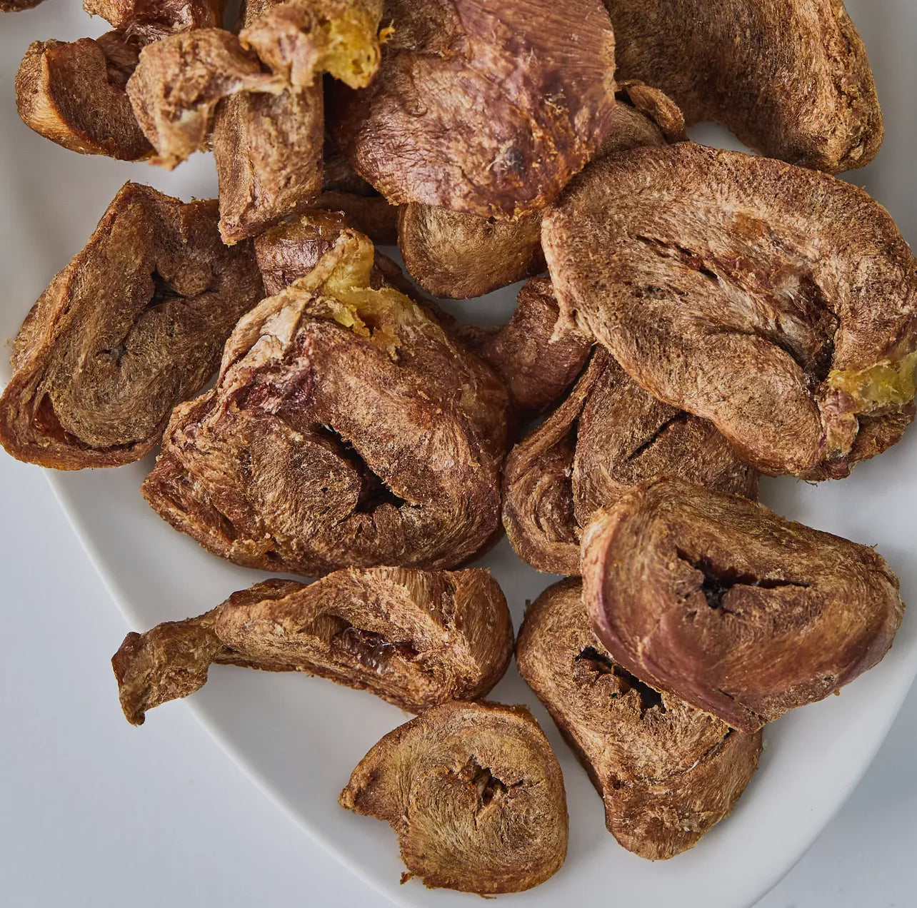 Plate of Barkin' turkey heart dog treats.